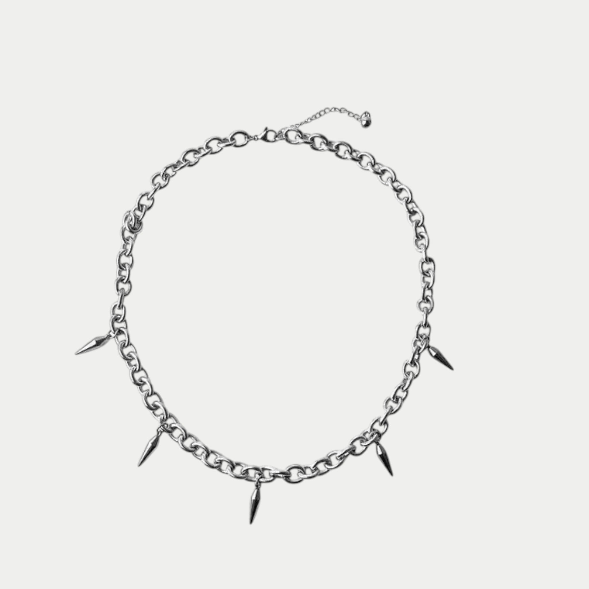 GOTHIC HOUR silver-tone chain necklace featuring pointed spike charms and an adjustable clasp for alternative styling.