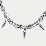 GOTHIC HOUR silver-tone chain necklace featuring sharp pointed spike charms for an alternative punk aesthetic.